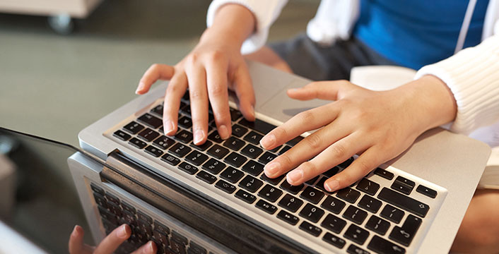 hands on laptop keys