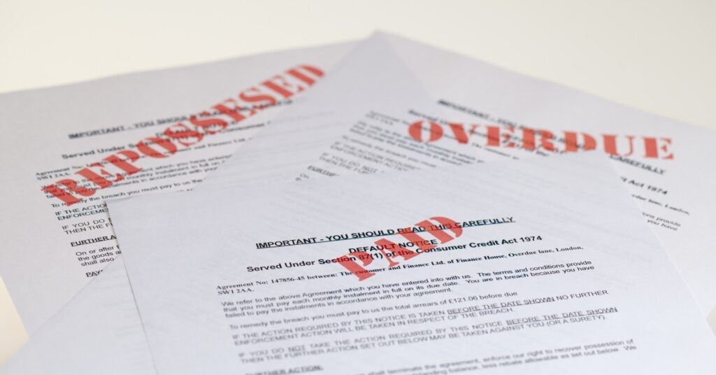 bills and notices with stamps on them